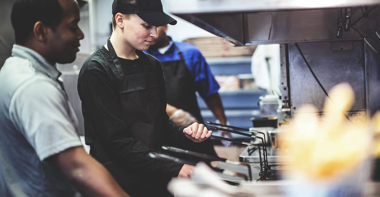 Cook at fryer