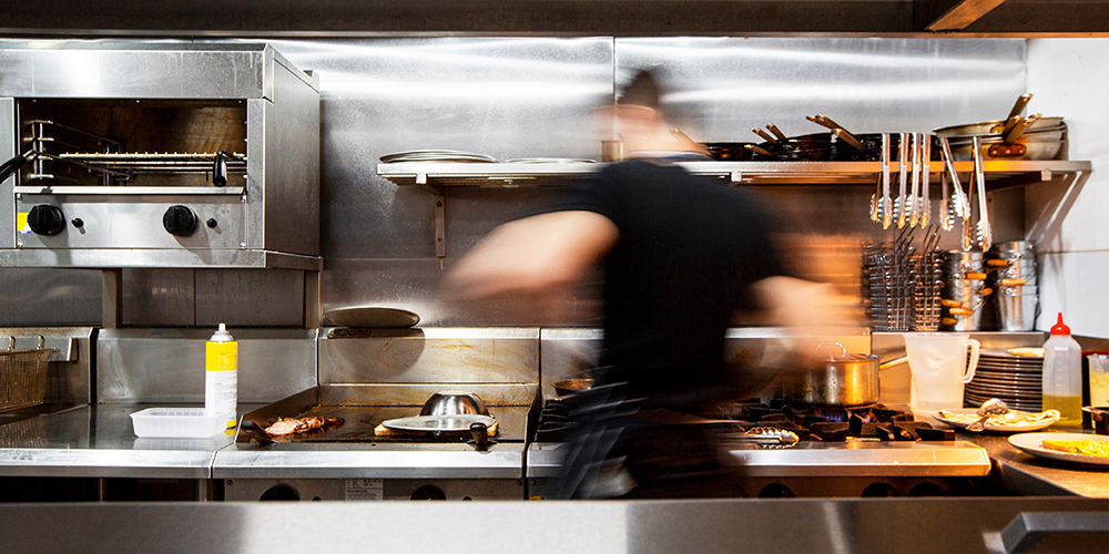 Worker in kitchen