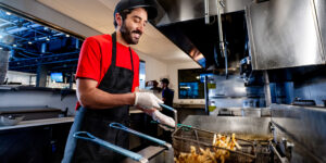 Employee frying food