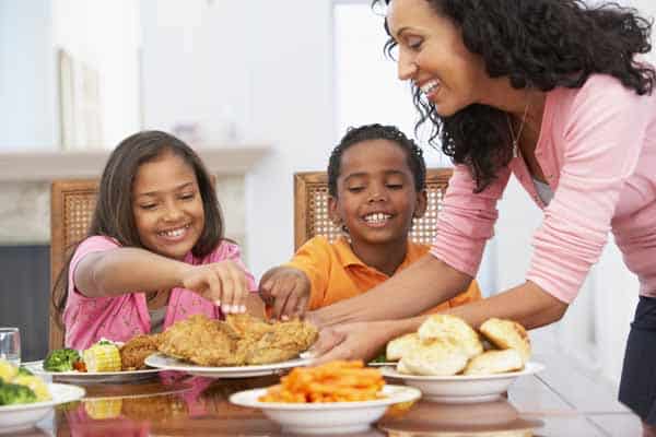 Family eating fried chicken