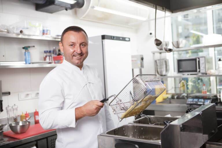 Chef frying french fries