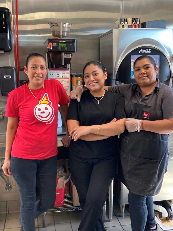 Jack in the Box employees in fast food kitchen