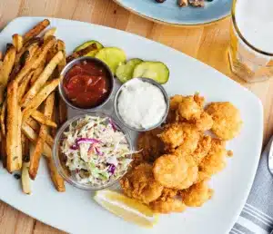 Fries and condiments on a plate