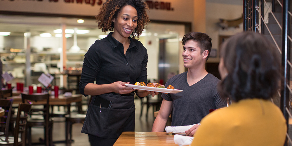 Server coming to table