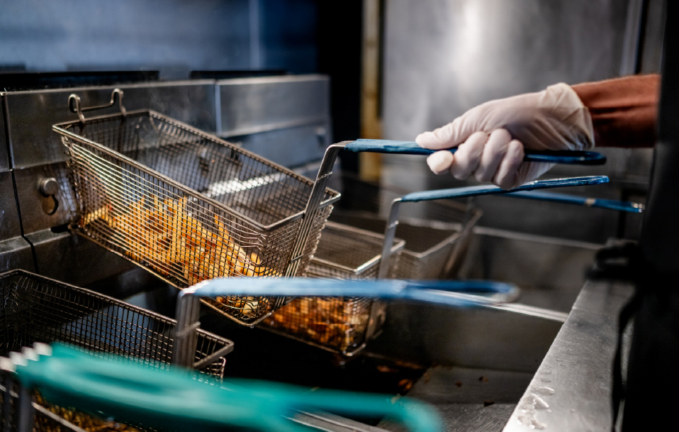 Fries coming out of fryer